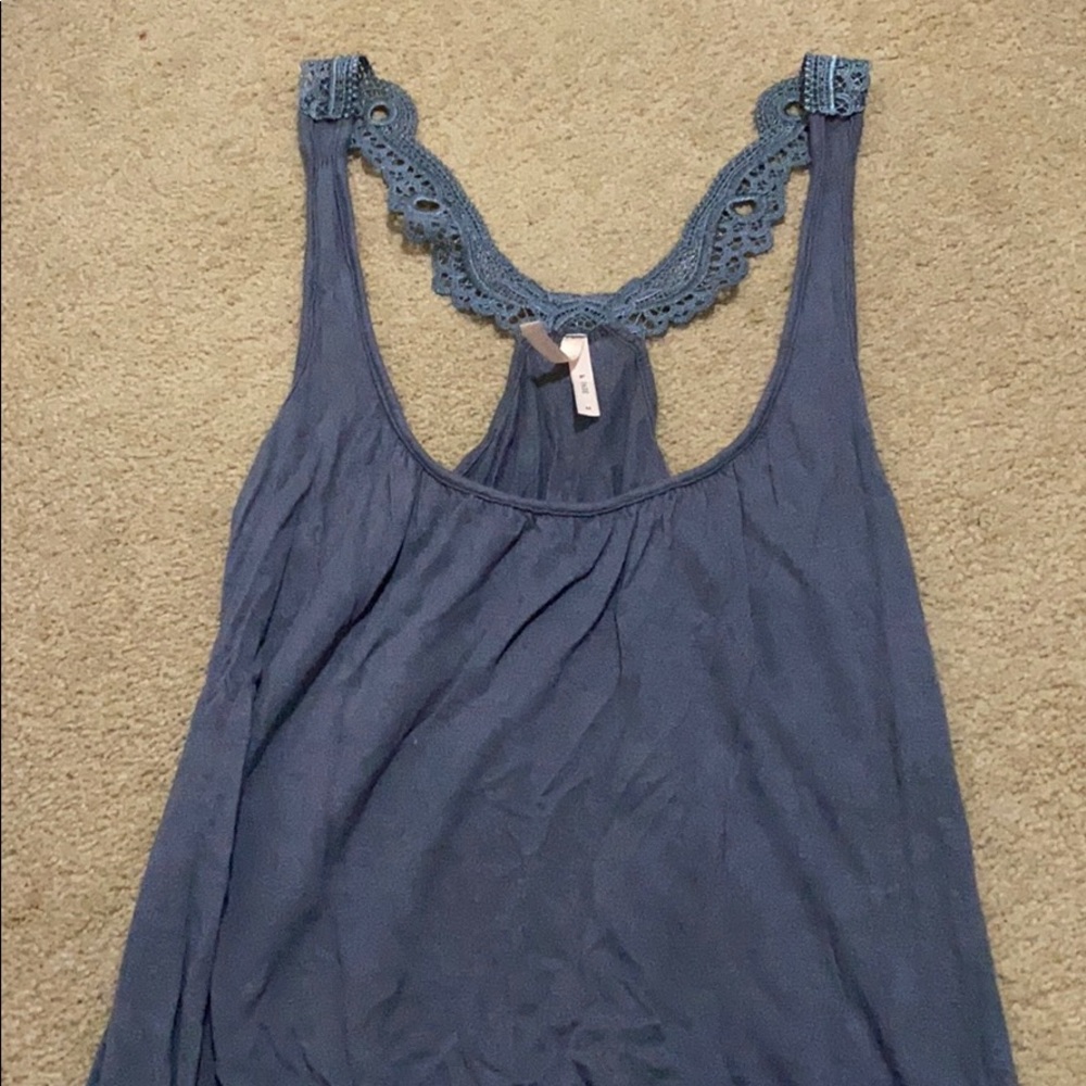 Women’s blouse gray, with lace details on straps.